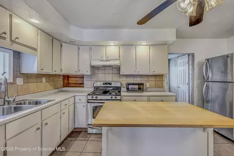 Kitchen - 640 E Grant St, Olyphant, PA 18447 photo 2 of 2