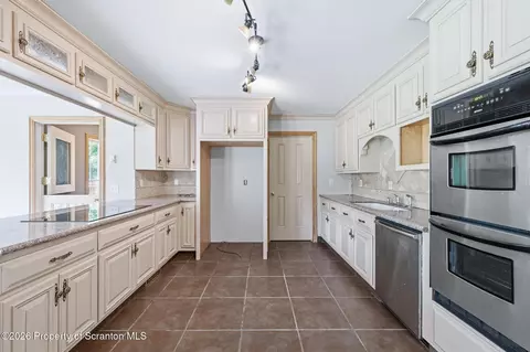 Kitchen - 116 Forge St, Old Forge, PA 18518 photo 2 of 4