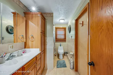 Bath - 1213 Mowry St, Old Forge, PA 18518 photo 1 of 4