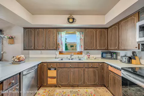 Kitchen - 1213 Mowry St, Old Forge, PA 18518 photo 2 of 2