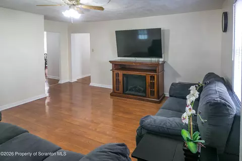 Living - 335 N Main St, Old Forge, PA 18518 photo 2 of 3
