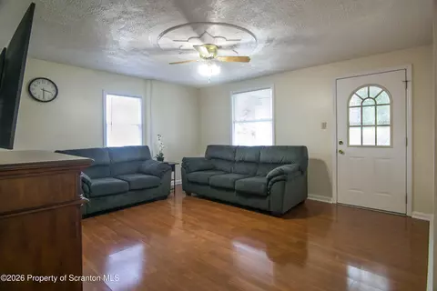 Living - 335 N Main St, Old Forge, PA 18518 photo 3 of 3