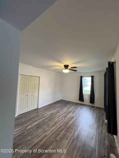Living - 412 Delaware Ave, Olyphant, PA 18447 photo 1 of 3