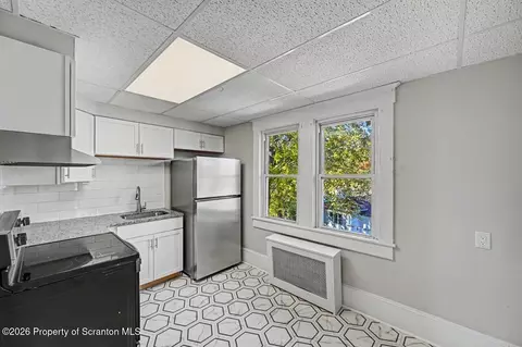 Kitchen - 31 Butler St, Old Forge, PA 18518 photo 1 of 3