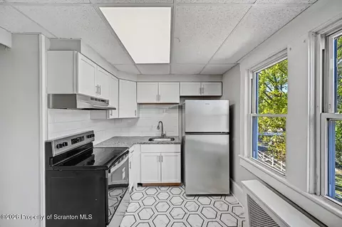 Kitchen - 31 Butler St, Old Forge, PA 18518 photo 3 of 3