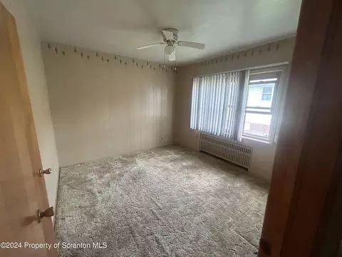 Bedroom - 605 Clark St, Old Forge, PA 18518 photo 2 of 7