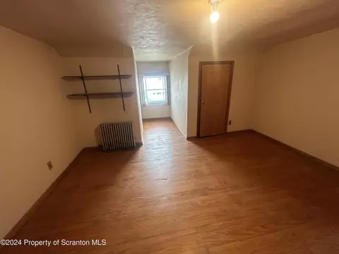 Bedroom - 605 Clark St, Old Forge, PA 18518 photo 4 of 7
