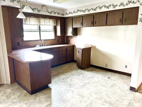 Kitchen - 605 Clark St, Old Forge, PA 18518 photo 2 of 3