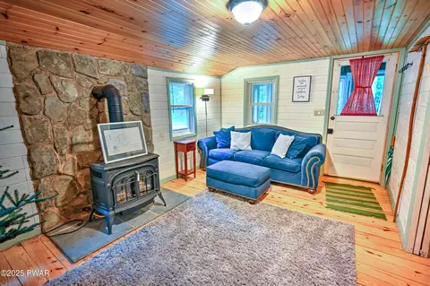 Living - 121 Ness Rd, Dingmans Ferry, PA 18328 photo 2 of 3
