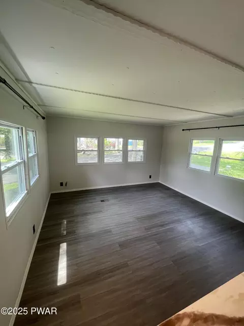 Living - 122 Bartion Ct, Bartonsville, PA 18321 photo 2 of 4
