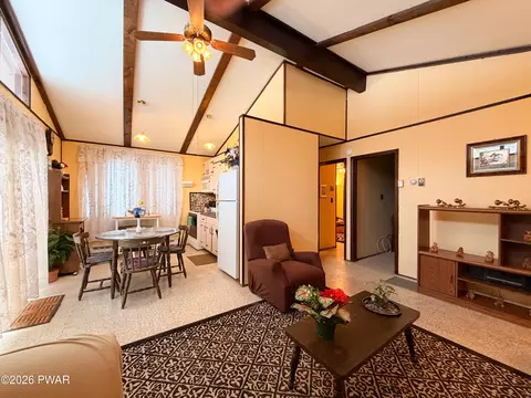 Living - 110 Spring Dr, Dingmans Ferry, PA 18328 photo 3 of 6