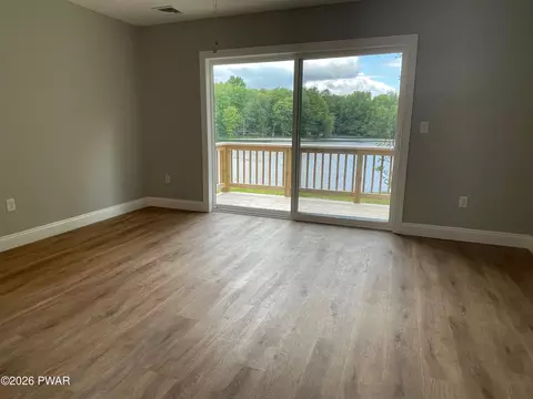Living - 157 E Shore Dr, Dingmans Ferry, PA 18328 photo 2 of 4