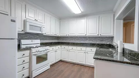 Kitchen - 142 E 2nd Ave, Petal, MS 39465 photo 3 of 5