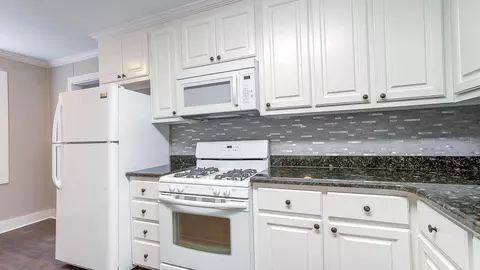 Kitchen - 142 E 2nd Ave, Petal, MS 39465 photo 4 of 5