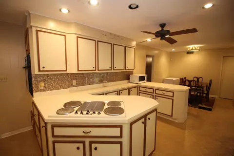 Kitchen - 3836 Millsaps Dr, Laurel, MS 39440 photo 7 of 11
