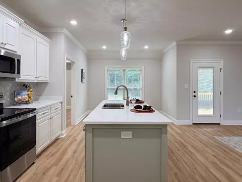 Kitchen - 64 Meadow Breeze Rd, Sumrall, MS 39482 photo 4 of 5