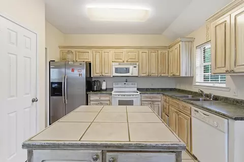 Kitchen - 22 Harper Pl, Petal, MS 39465 photo 2 of 3