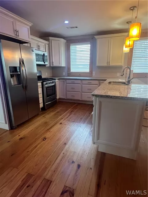 Kitchen - 305 8th St N, Clanton, AL 35045 photo 1 of 3