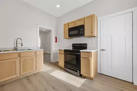 Kitchen - 1007 E Avenue NW, Cedar Rapids, IA 52405 photo 2 of 3