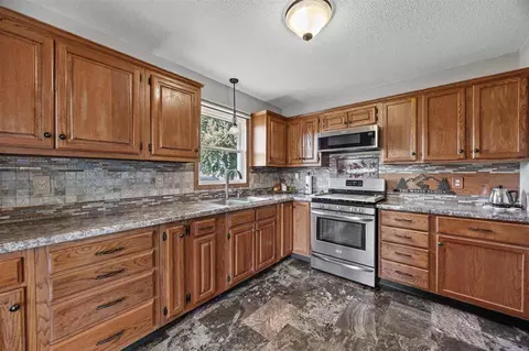 Kitchen - 307 Cottage St NW, Shellsburg, IA 52332 photo 2 of 5
