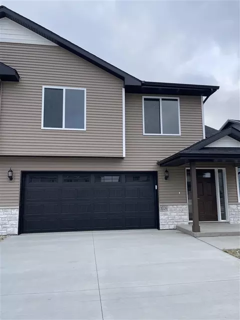 802 Armands Ln, Tiffin, IA 52340