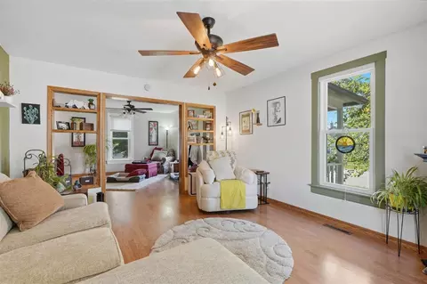 Living - 131 E 2nd St, Riverside, IA 52327 photo 1 of 3