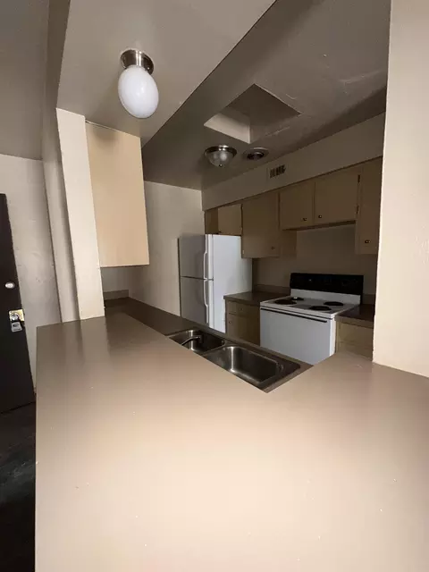 Kitchen - 2219 E Travis St, Laredo, TX 78041 photo 1 of 2