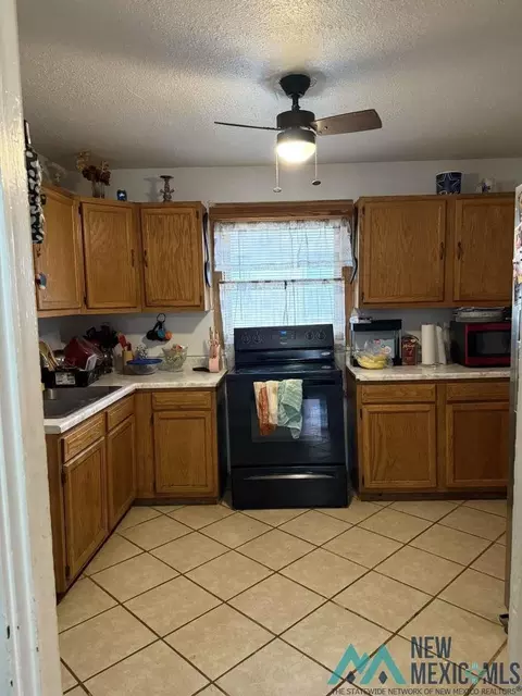 Kitchen - 1212 Wallace St, Clovis, NM 88101 photo 1 of 2