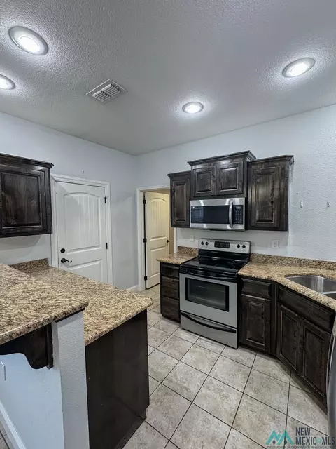 Kitchen - 717 Almond Tree Ln, Clovis, NM 88101 photo 2 of 2