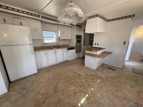 Kitchen - 309 Wheatridge Dr, Clovis, NM 88101 photo 1 of 2