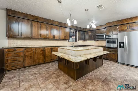 Kitchen - 957 State Road 77, Clovis, NM 88101 photo 2 of 4