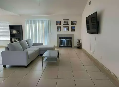 Living - 555 W Ashcroft Ave, Clovis, CA 93612 photo 2 of 4