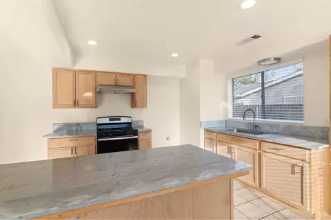 Kitchen - 555 W Ashcroft Ave, Clovis, CA 93612 photo 2 of 2