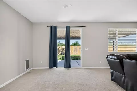 Living - 1442 Encantada Ave, Madera, CA 93637 photo 3 of 3