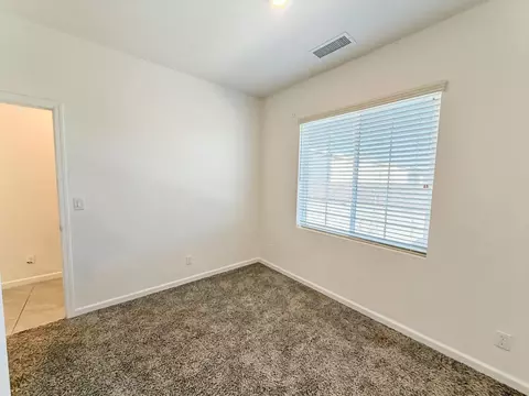 Bedroom - 509 Sandtrap Ln, Lemoore, CA 93245 photo 2 of 8