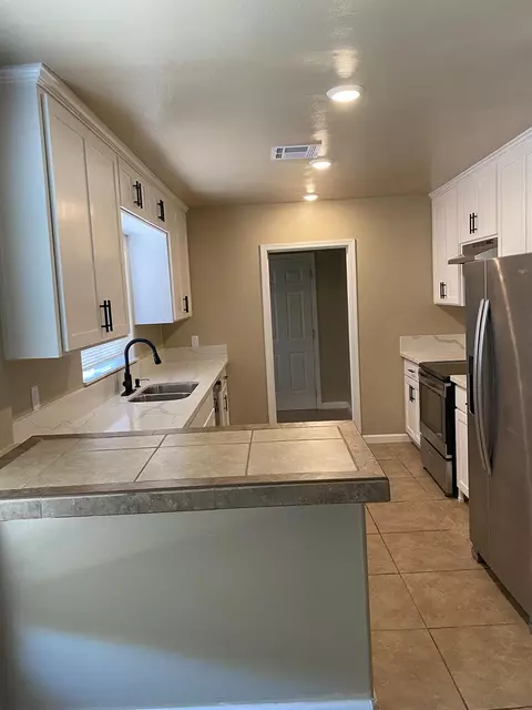 Kitchen - 424 S A St, Madera, CA 93638 photo 14 of 14