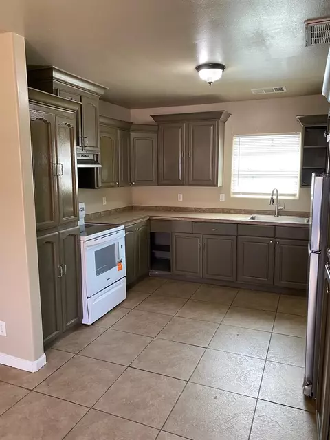 Kitchen - 424 S A St, Madera, CA 93638 photo 2 of 14