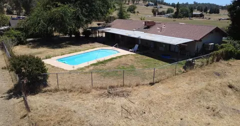 Exterior - 32644 Quail Ln, Yokuts Valley, CA 93675 photo 2 of 14
