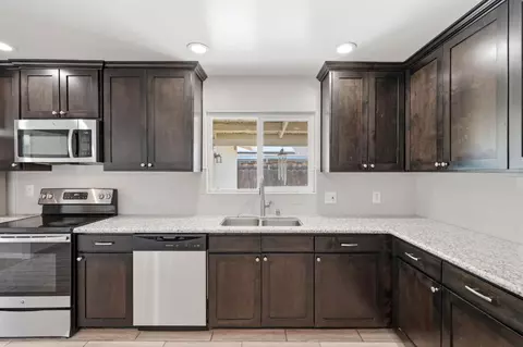 Kitchen - 335 E Sycamore Dr, Hanford, CA 93230 photo 3 of 4