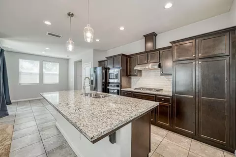 Kitchen - 6037 E Brick Dr, Fresno, CA 93727 photo 2 of 2