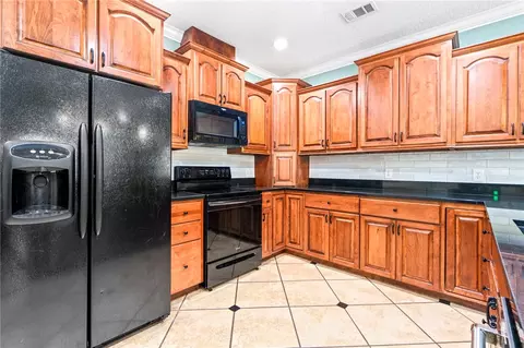 Kitchen - 572 E University Dr, Auburn, AL 36830 photo 2 of 2