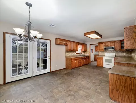 Kitchen - 706 Delaware St, Sallisaw, OK 74955 photo 3 of 3