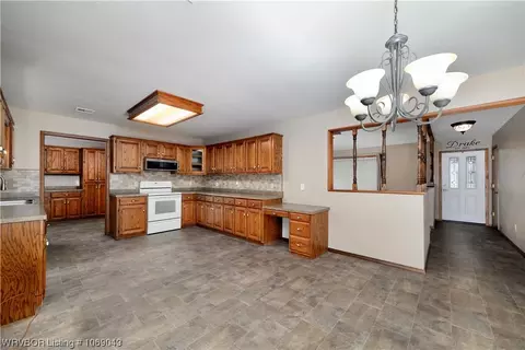 Kitchen - 706 Delaware St, Sallisaw, OK 74955 photo 1 of 3