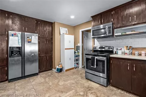 Kitchen - 319 E Mary St, Paris, AR 72855 photo 2 of 4