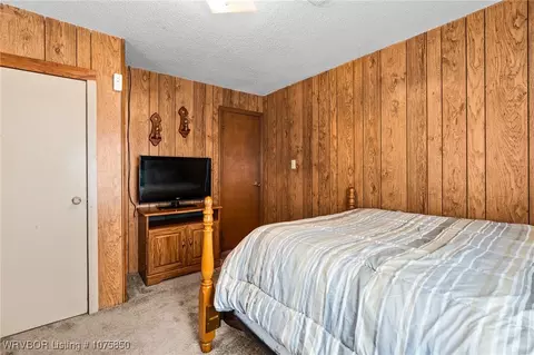 Bedroom - 716 E Adams Ave, Midland, AR 72945 photo 2 of 7