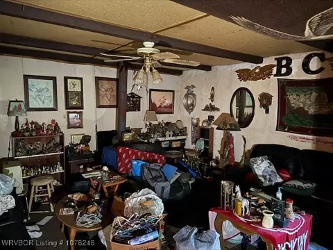 Living - 410 S Monroe Way, Midland, AR 72945 photo 1 of 1