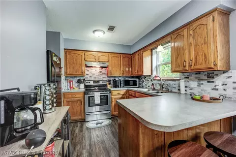 Kitchen - 201 W Houston St, Lavaca, AR 72941 photo 2 of 4