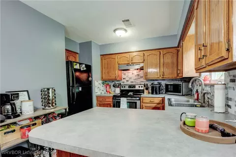 Kitchen - 201 W Houston St, Lavaca, AR 72941 photo 3 of 4