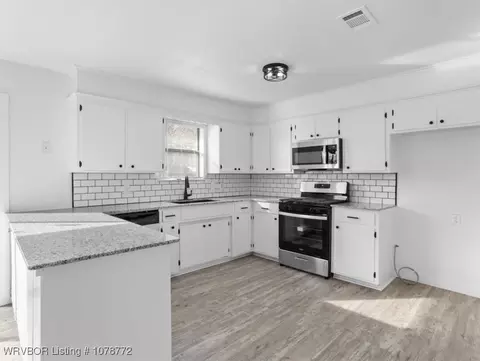 Kitchen - 101 Cesar St, Pocola, OK 74902 photo 1 of 2
