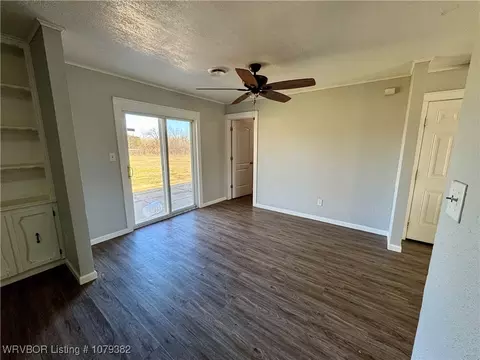 Living - 1310 Hickman Bluff Rd, Lavaca, AR 72941 photo 7 of 10